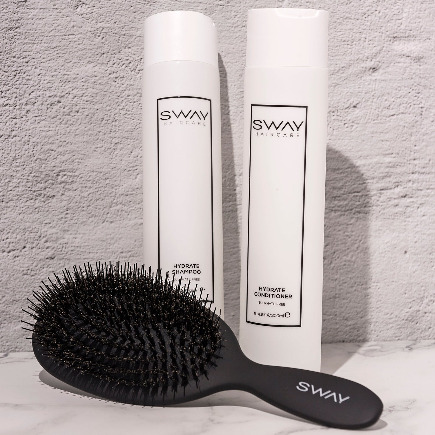 brush with shampoo and conditioner