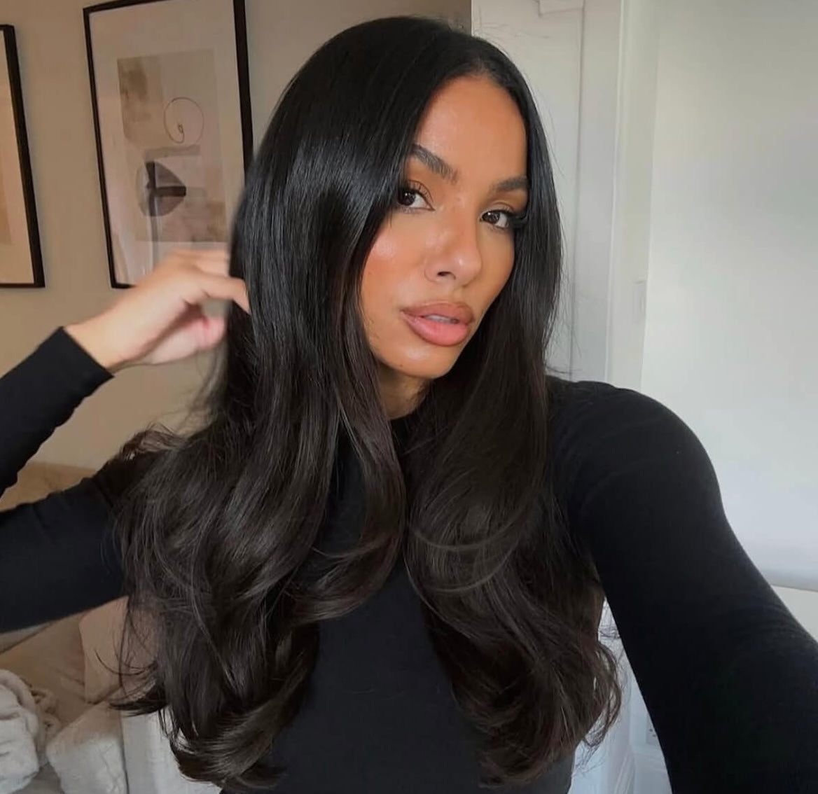 model showing black hair extensions