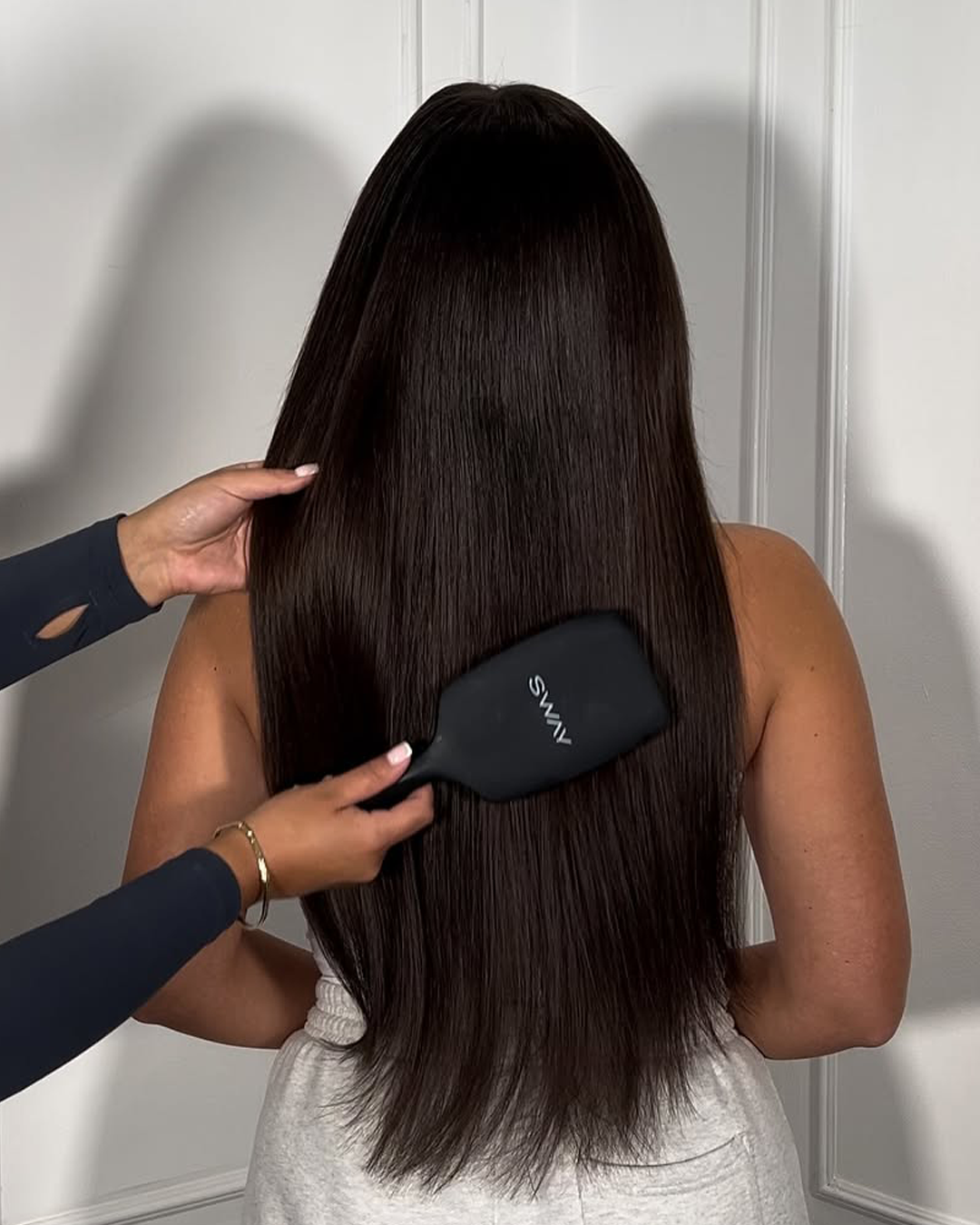 extensions being brushed