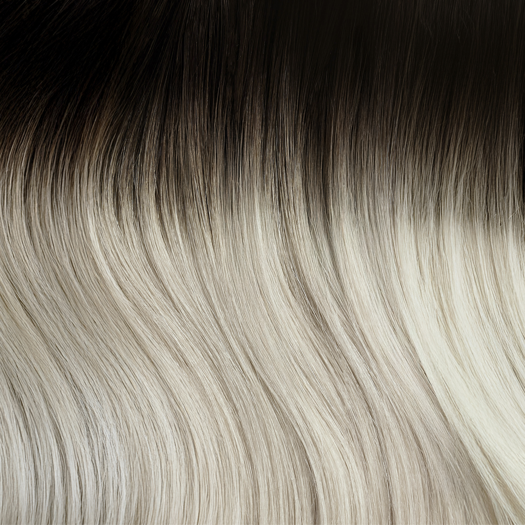 SEAMLESS® Tapes 20 Inches - SWAY Hair Extensions Rooted-Pure-Platinum-R2-60A clip-in hair extensions made of 100% Double Drawn, Remy Human Hair. SWAY SEAMLESS® Tapes, 20 inches. Lightweight, flexible, and perfect for any hairstyle.