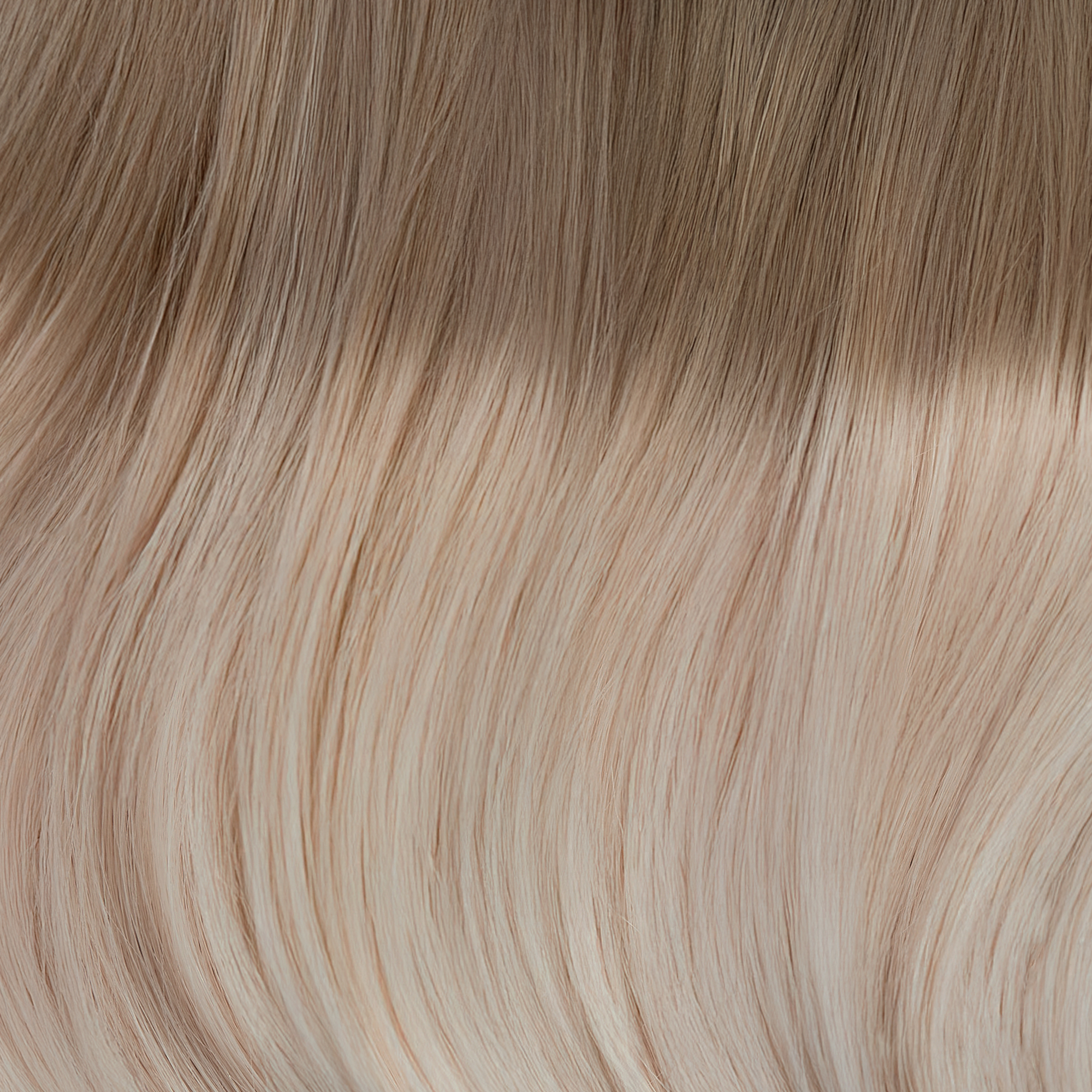 SEAMLESS® Tapes 16 Inches - SWAY Hair Extensions Rooted-Beach-Ash-Blonde-R5-9-613 clip-in hair extensions made of 100% Double Drawn, Remy Human Hair. SWAY SEAMLESS® Tapes, 16 inches. Lightweight, flexible, and perfect for any hairstyle.