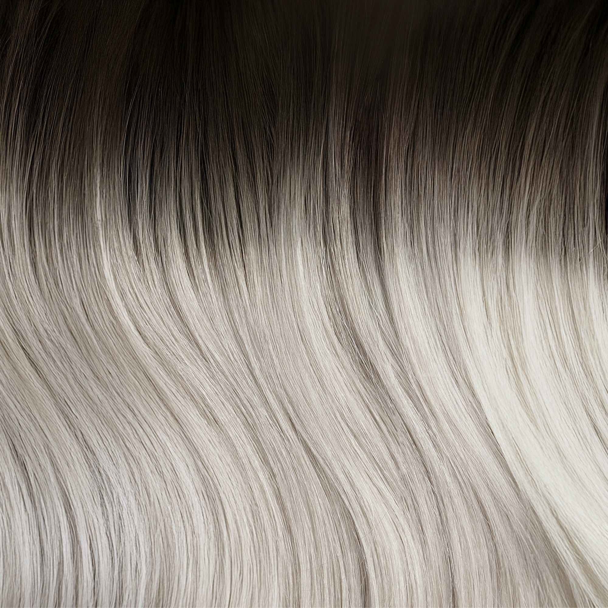 SEAMLESS® Tapes 20 Inches - SWAY Hair Extensions Rooted-Silver-Ash clip-in hair extensions made of 100% Double Drawn, Remy Human Hair. SWAY SEAMLESS® Tapes, 20 inches. Lightweight, flexible, and perfect for any hairstyle.