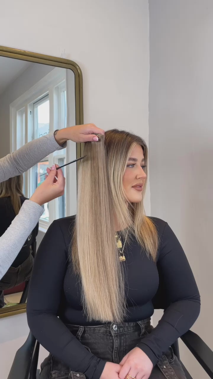 How to apply SEAMLESS® Tapes 24 inch - SWAY Hair Extensions - Thin, flexible, and discreet. 100% Double Drawn Remy Human Hair. Versatile and reusable.