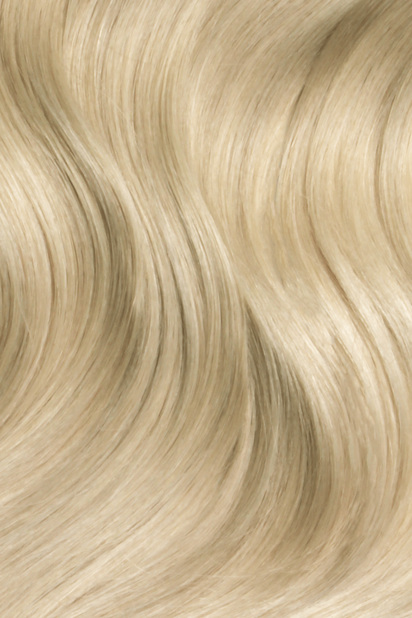SEAMLESS® Tapes 16 Inches - SWAY Hair Extensions Hollywood-Ash-Blonde-18A-613A clip-in hair extensions made of 100% Double Drawn, Remy Human Hair. SWAY SEAMLESS® Tapes, 16 inches. Lightweight, flexible, and perfect for any hairstyle.