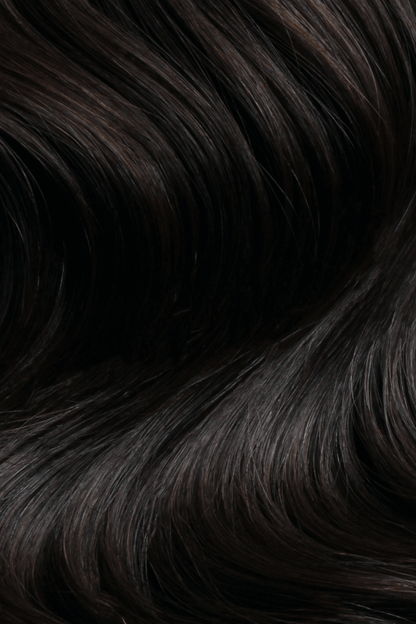 SEAMLESS® Tapes 18 Inches - SWAY Hair Extensions Natural-Black-1B clip-in hair extensions made of 100% Double Drawn, Remy Human Hair. SWAY SEAMLESS® Tapes, 18 inches. Lightweight, flexible, and perfect for any hairstyle.