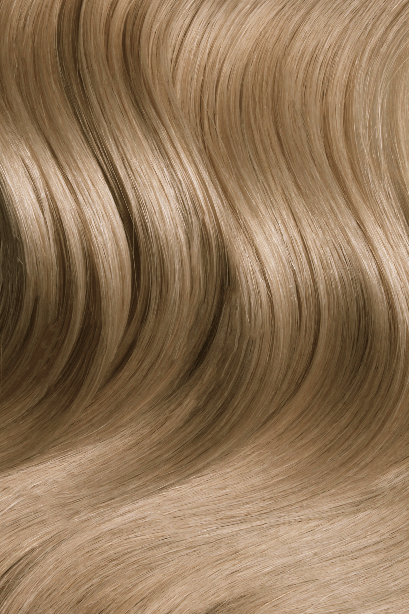 SEAMLESS® Tapes 16 Inches - SWAY Hair Extensions Ash-Blondette-7-20 clip-in hair extensions made of 100% Double Drawn, Remy Human Hair. SWAY SEAMLESS® Tapes, 16 inches. Lightweight, flexible, and perfect for any hairstyle.